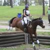 Kristen and Briley jumping into the sunken road at Southern Pines II, March 2012.